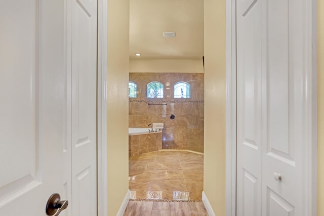 bathroom with a bathing tub