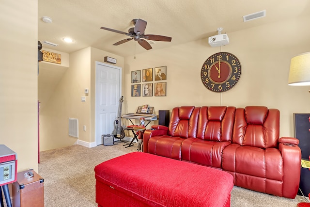 carpeted living room featuring ceiling fan