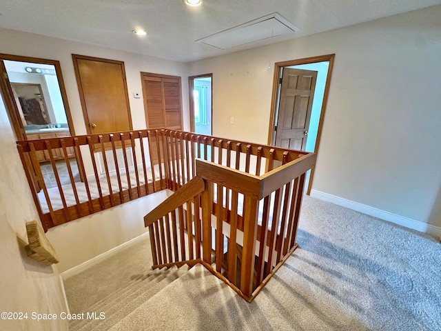 1248 Water Lily Ln, Rockledge, FL 32955 - stairs featuring attic access, carpet, and recessed lighting
