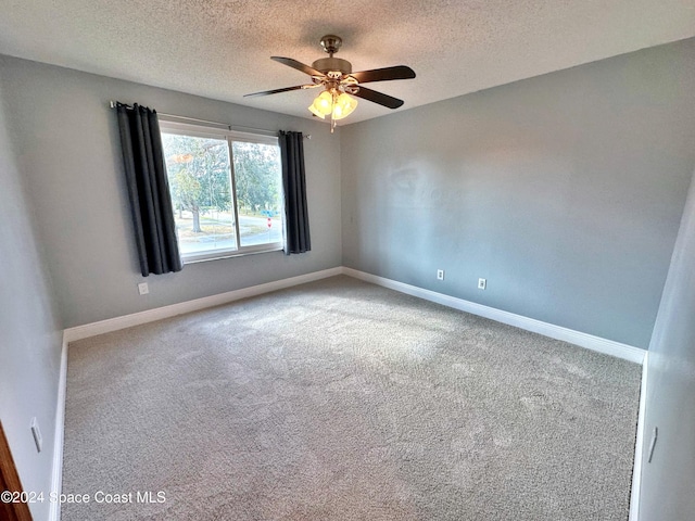 1248 Water Lily Ln, Rockledge, FL 32955 - carpeted empty room with ceiling fan and a textured ceiling