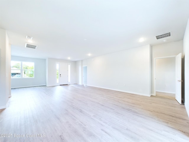 empty room with light wood-type flooring