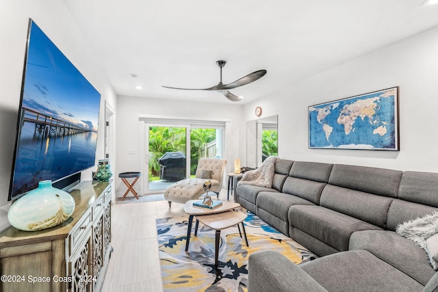 living room featuring ceiling fan