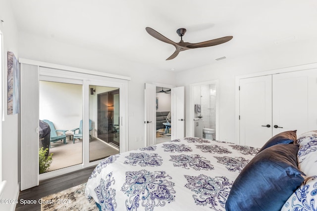 bedroom with two closets, ceiling fan, connected bathroom, and dark hardwood / wood-style flooring