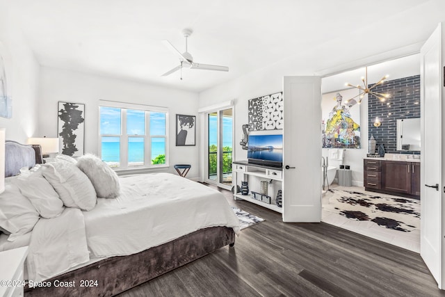 bedroom featuring ceiling fan with notable chandelier, dark hardwood / wood-style flooring, and access to outside