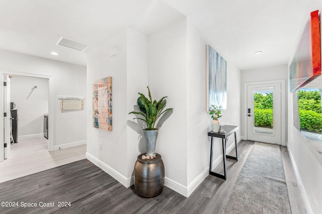 corridor featuring hardwood / wood-style flooring