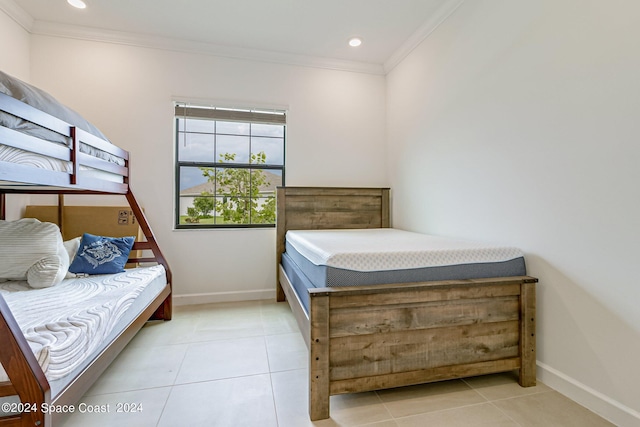 bedroom with light tile patterned floors and ornamental molding