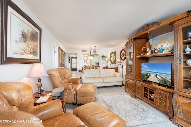 living room featuring light tile patterned flooring