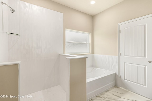 bathroom with independent shower and bath and tile patterned floors