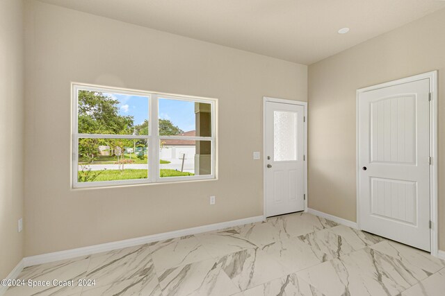 view of tiled foyer