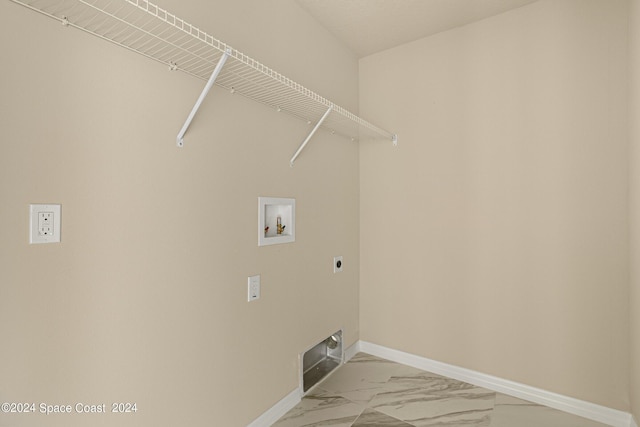 laundry room featuring laundry area, baseboards, marble finish floor, hookup for an electric dryer, and washer hookup