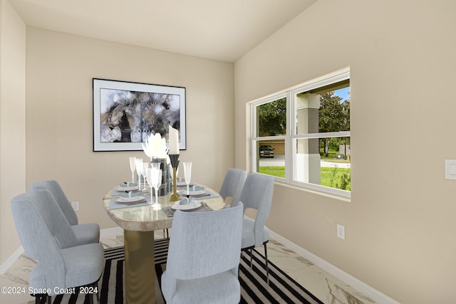 dining area with light tile patterned floors