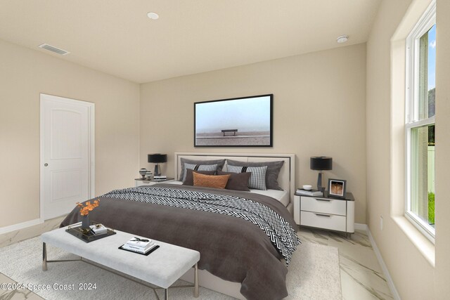 bedroom with light tile patterned flooring