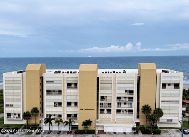 view of property with a water view