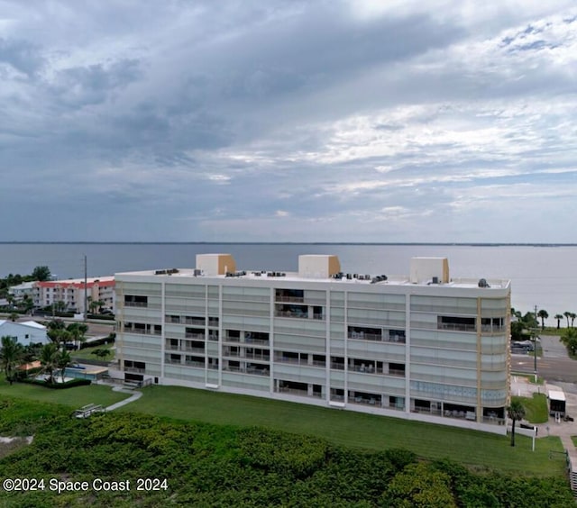 view of building exterior featuring a water view