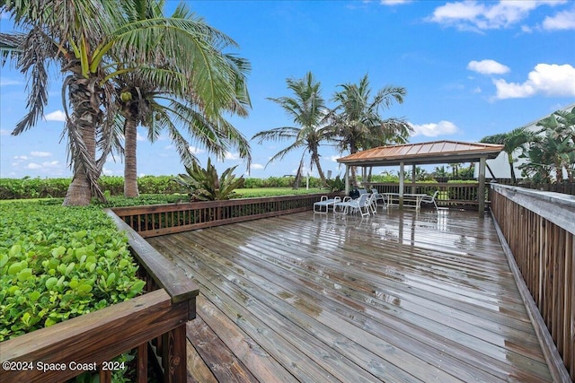 wooden deck featuring a gazebo