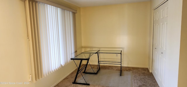 office area with baseboards and carpet flooring