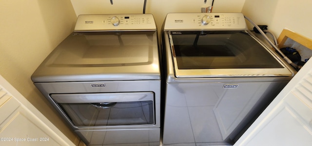 laundry area featuring independent washer and dryer