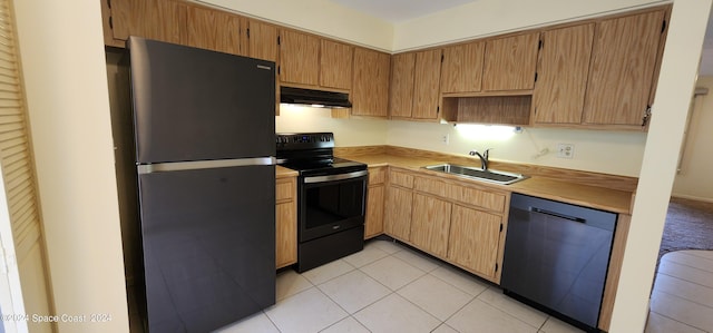 kitchen with black dishwasher, light tile patterned floors, electric range, sink, and fridge