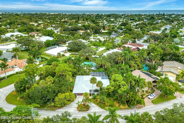 drone / aerial view with a water view