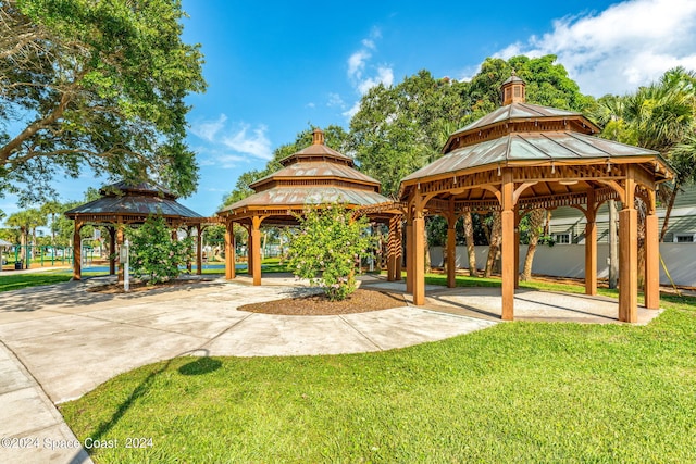 view of community with a yard and a gazebo