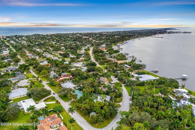 drone / aerial view featuring a water view