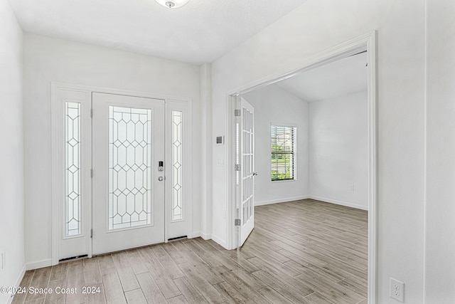 foyer entrance featuring light hardwood / wood-style floors