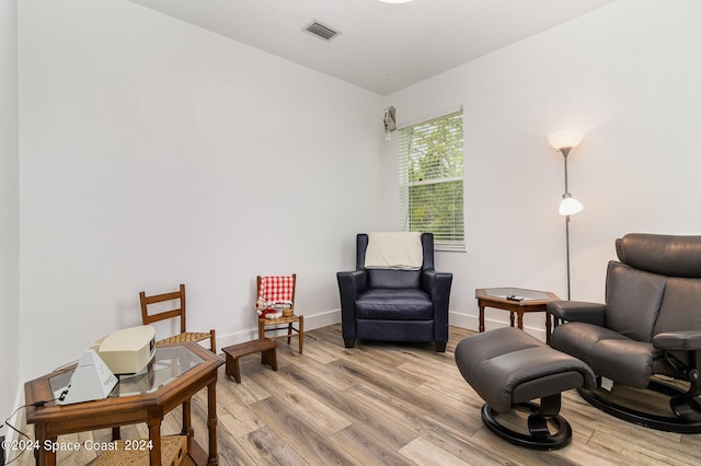 sitting room with light wood-type flooring