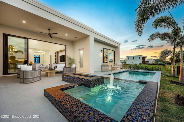 view of swimming pool featuring an outdoor hangout area, ceiling fan, and a patio