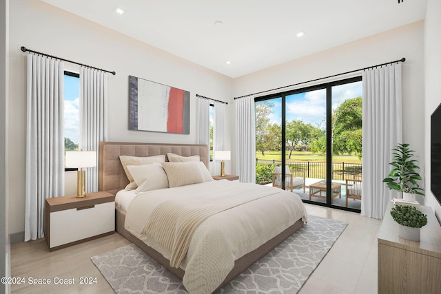 tiled bedroom featuring access to outside