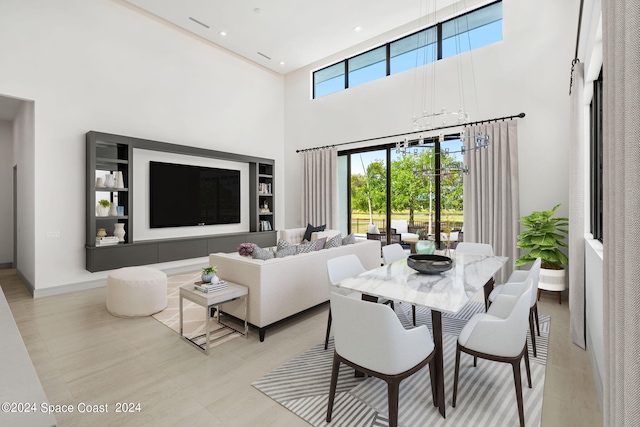 dining room featuring a high ceiling