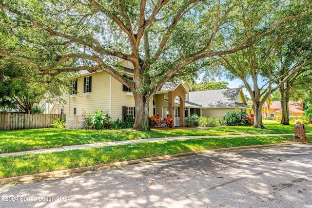 view of front of house with a front lawn