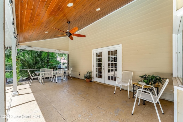 view of patio / terrace featuring ceiling fan and french doors