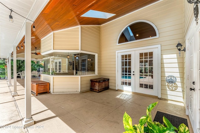 view of patio with ceiling fan and french doors