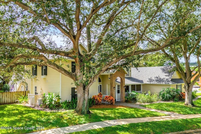 view of front of property with a front lawn