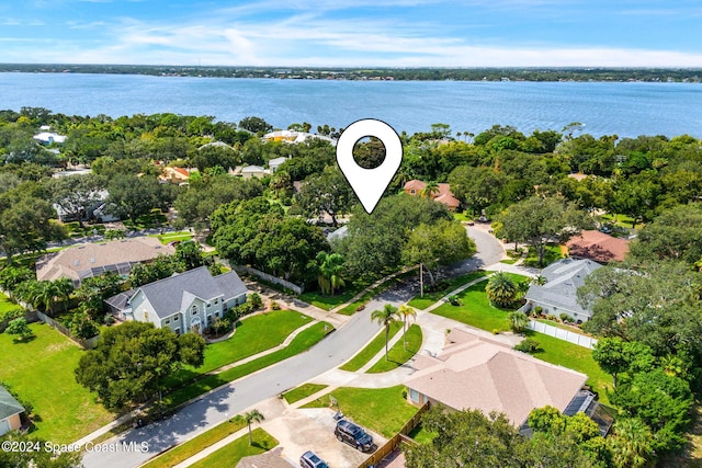 birds eye view of property featuring a water view