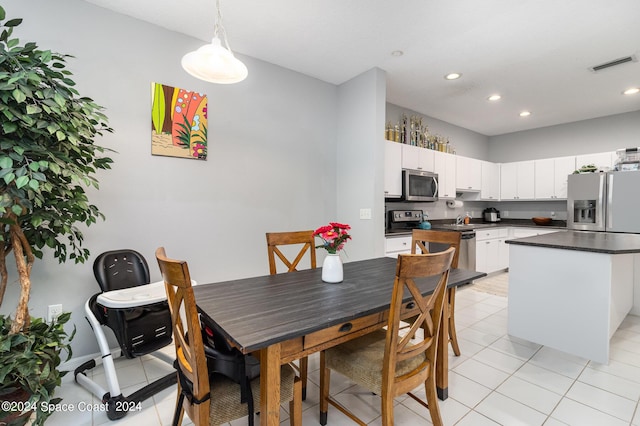 dining space featuring recessed lighting, visible vents, and light tile patterned floors