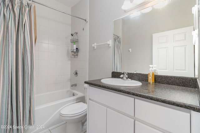 bathroom featuring shower / tub combo, vanity, and toilet