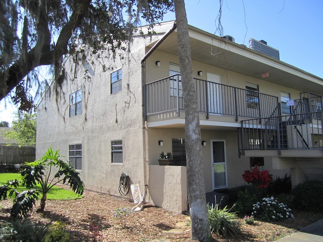 rear view of house with a balcony