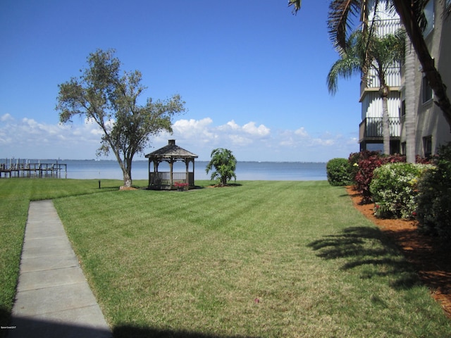 view of yard with a water view and a gazebo