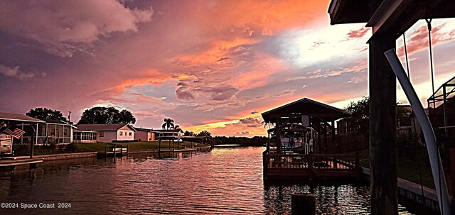 view of dock with a water view