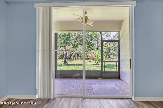 entryway with wood-type flooring