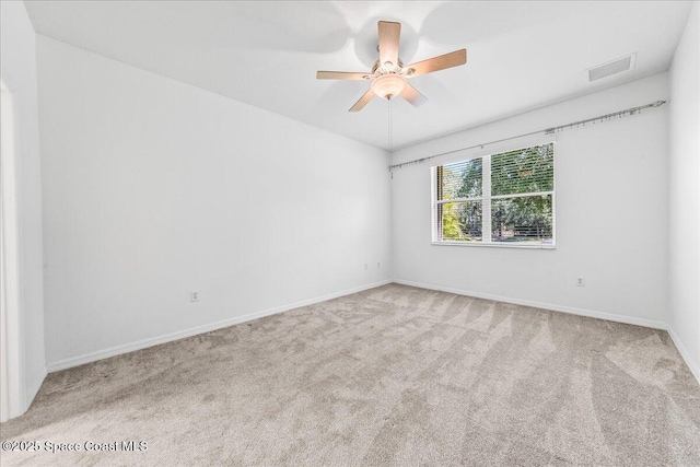 673 Remington Green Dr SE, Palm Bay, FL 32909 - unfurnished room with carpet flooring, visible vents, baseboards, and a ceiling fan