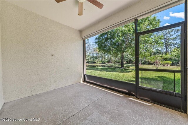 673 Remington Green Dr SE, Palm Bay, FL 32909 - unfurnished sunroom with ceiling fan