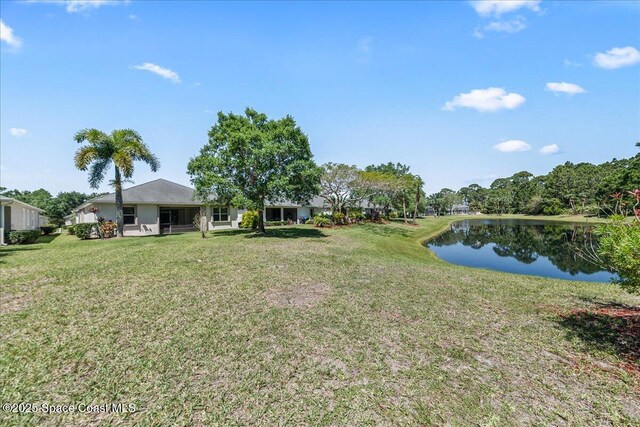673 Remington Green Dr SE, Palm Bay, FL 32909 - view of yard with a water view