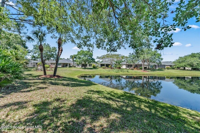 673 Remington Green Dr SE, Palm Bay, FL 32909 - view of water feature with a residential view