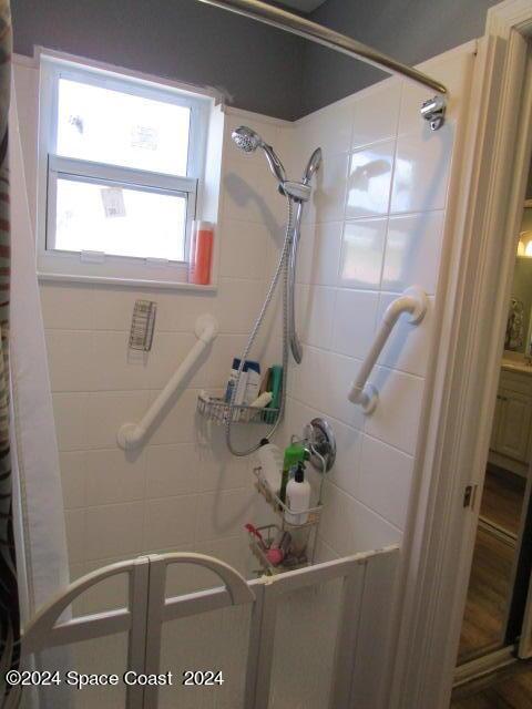 bathroom featuring walk in shower