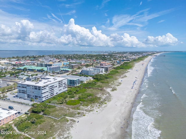 aerial view with a beach view and a water view