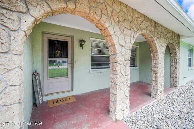 property entrance with a porch