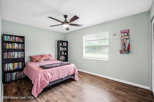 bedroom featuring dark wood-type flooring and ceiling fan