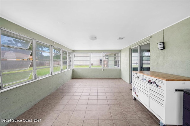 view of unfurnished sunroom